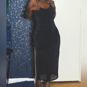 Open back glitter dress.
